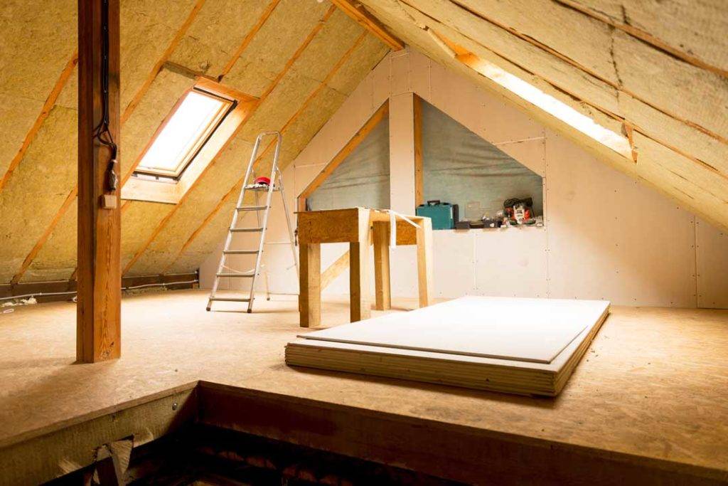 House Attic Under Construction Mansard Wall Insulation With Rock